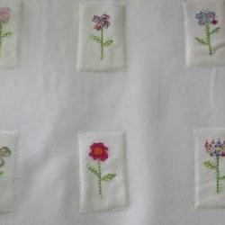 baby girls baby blanket with flowers in cream